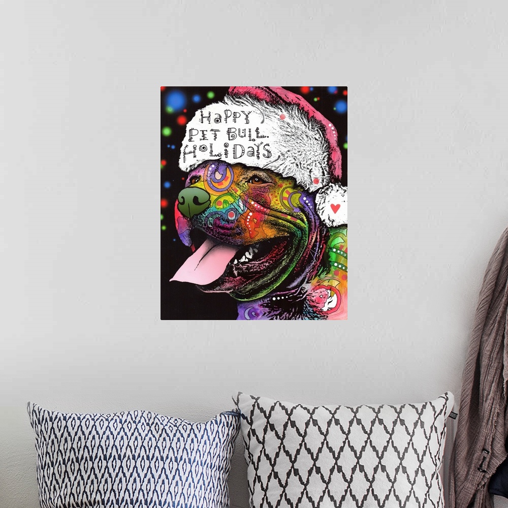 A bohemian room featuring "Happy Pit Bull Holidays" handwritten on a Santa hat that a happy pit bull covered in different c...