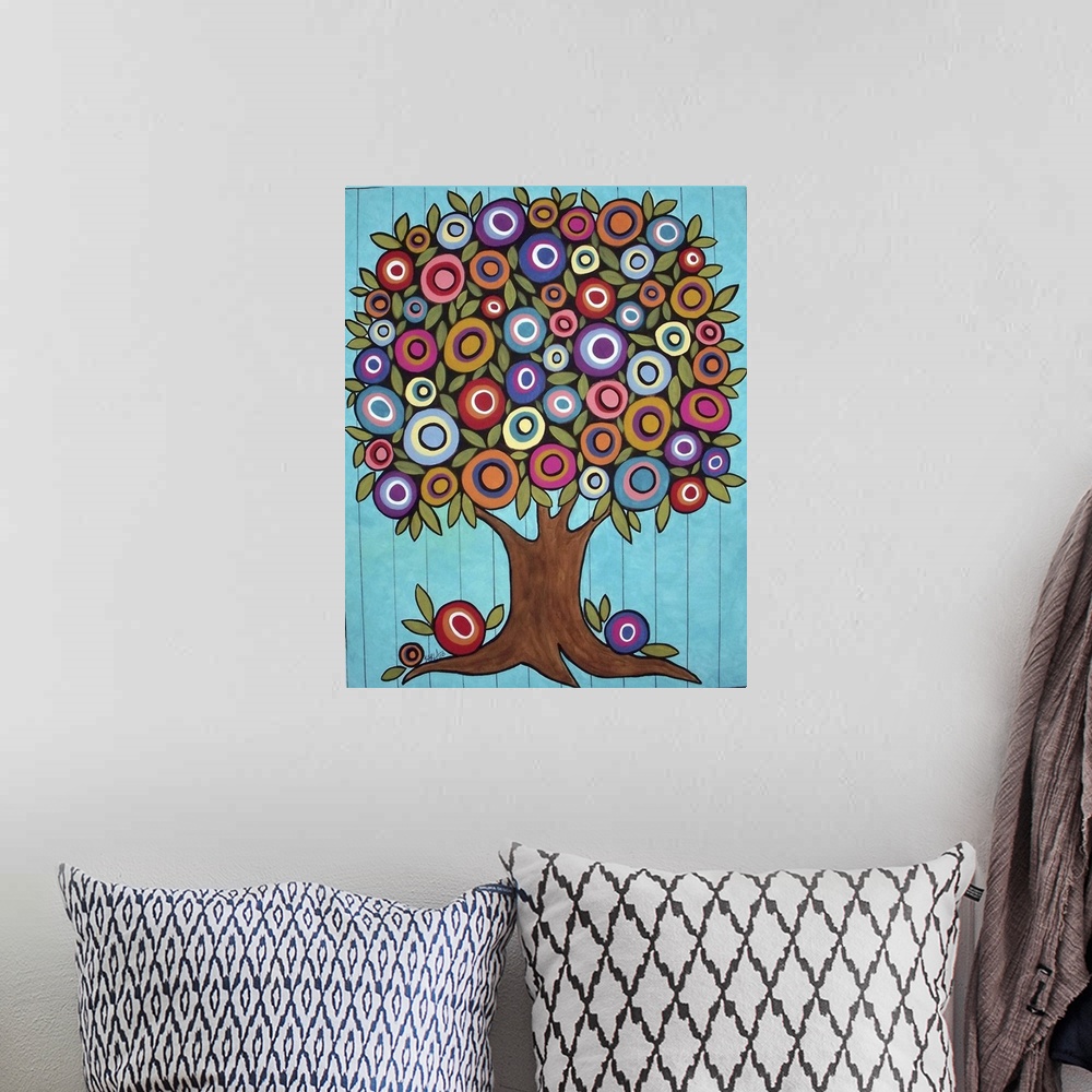 A bohemian room featuring Contemporary painting of a tree with multi-colored round flowers.
