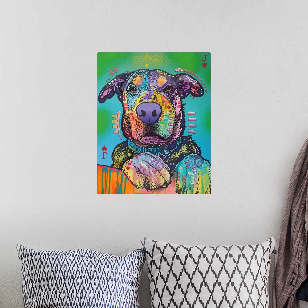 A bohemian room featuring Colorfully designed painting of a dog with its paws in the foreground on a blue and green backgro...