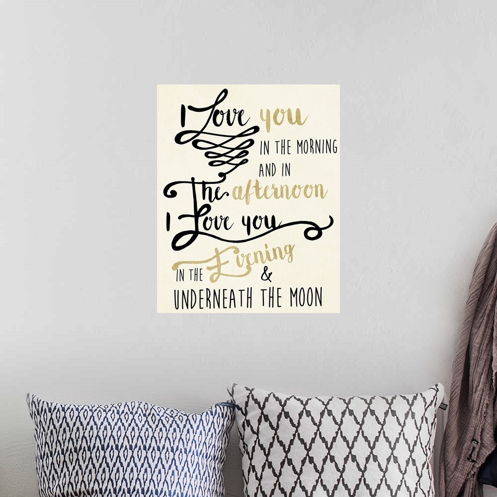 A bohemian room featuring Gold and black typography