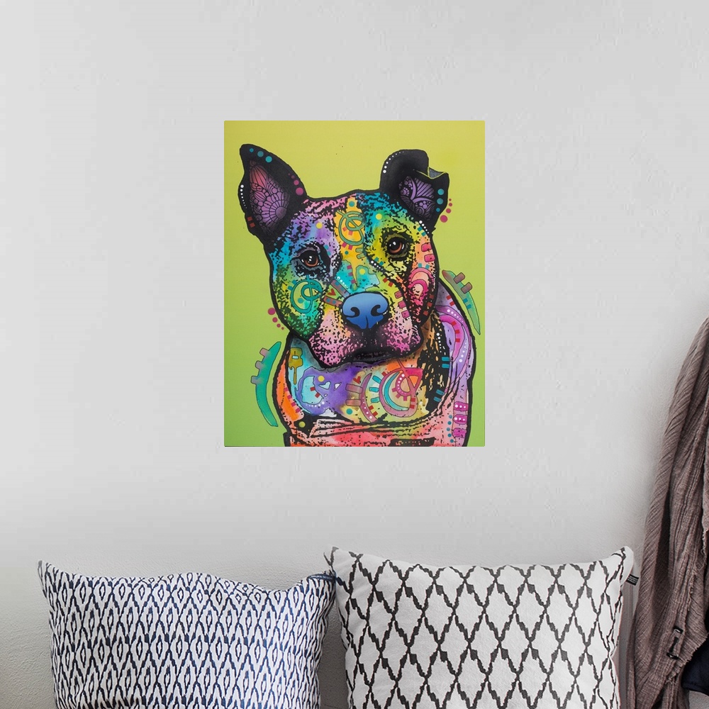 A bohemian room featuring Colorful painting of a pit bull covered in shaped designs on a yellow-green background.