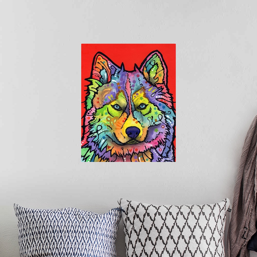 A bohemian room featuring Colorful painting of a wolf with abstract markings on a bright red background.