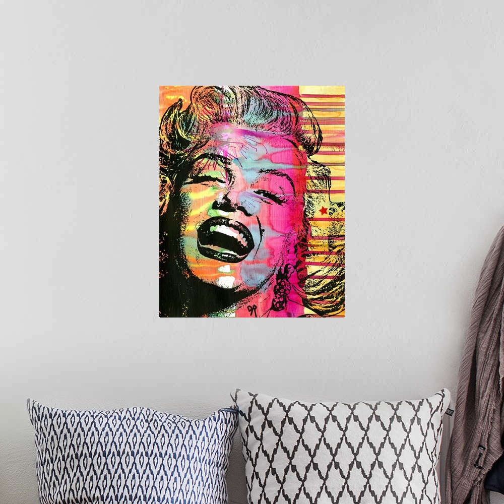 A bohemian room featuring Colorful illustration of Marilyn Monroe laughing with busy painted designs in the background.