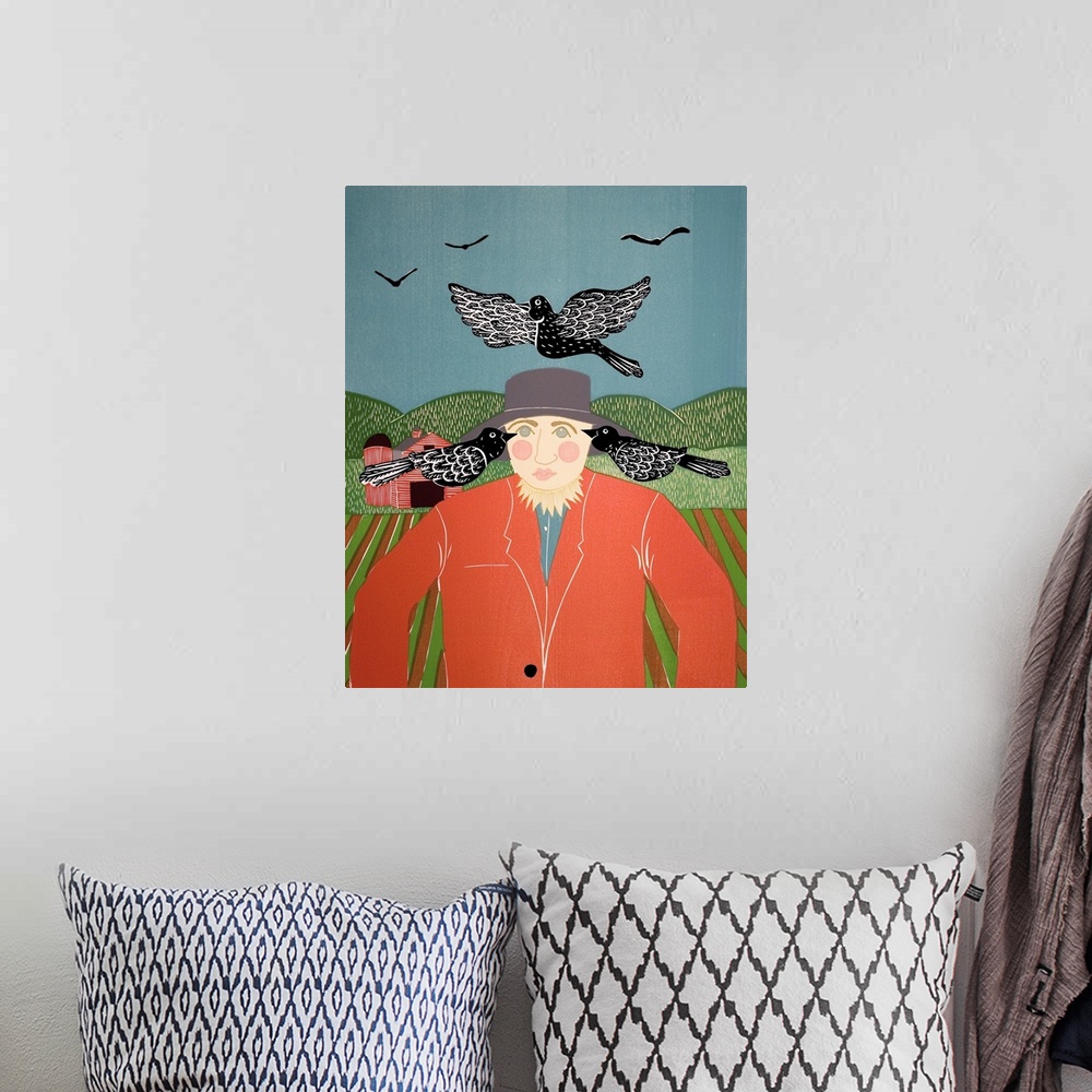 A bohemian room featuring Illustration of a scarecrow in a field surrounded by black crows with a red barn in the background.