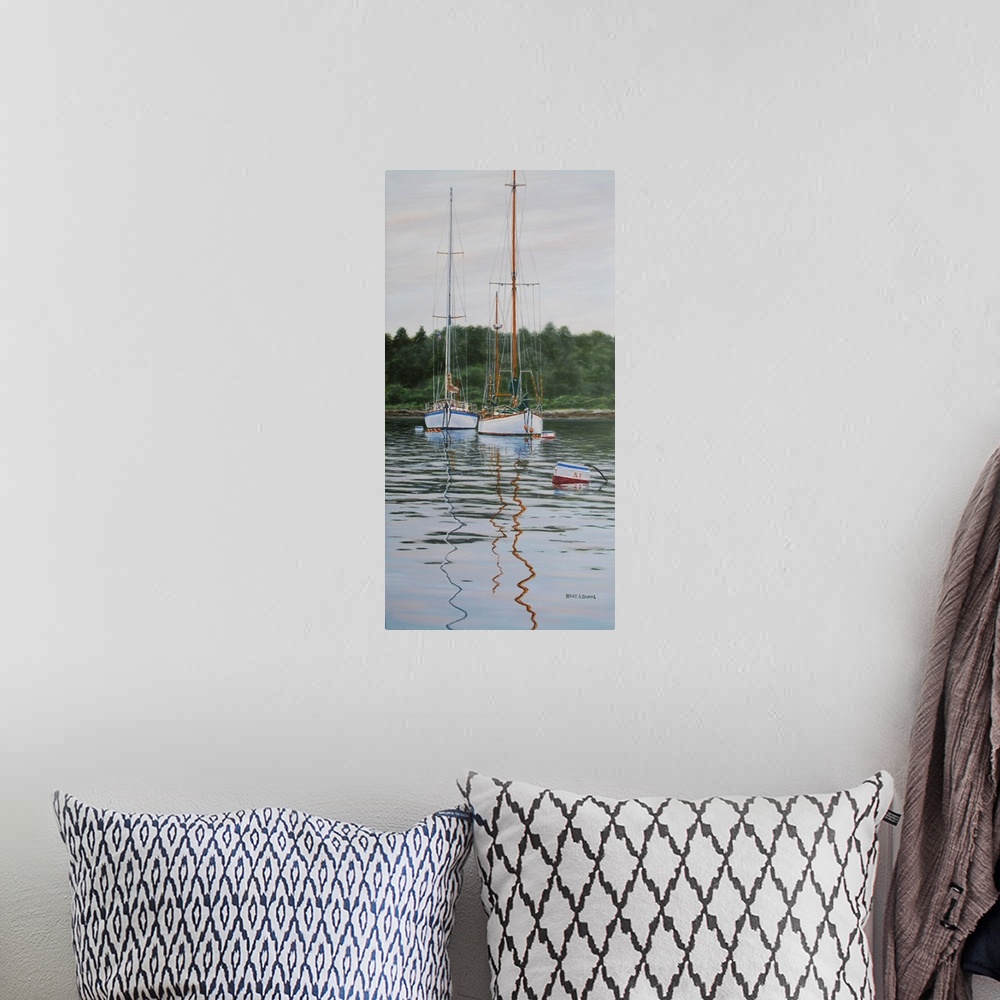 A bohemian room featuring Contemporary artwork of two tall sailboats in the water.