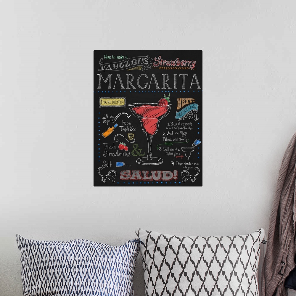 A bohemian room featuring Chalkboard-style sign with instructions and ingredients for making a strawberry margarita.