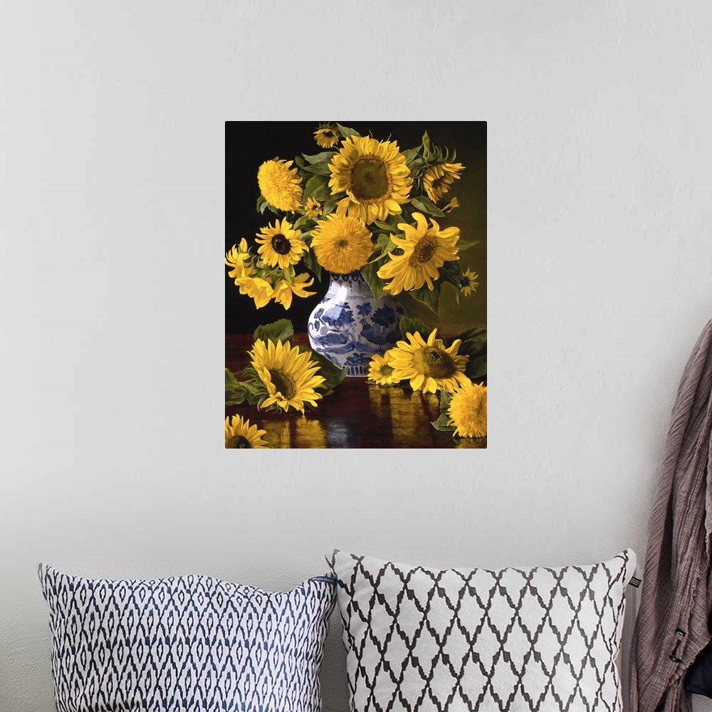 A bohemian room featuring Contemporary still-life painting of big yellow sunflowers in a Chinese vase.