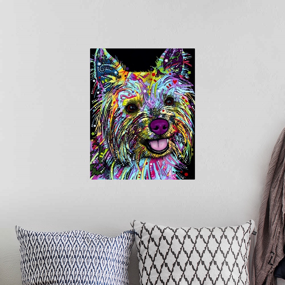 A bohemian room featuring Colorful painting of a Yorkie with graffiti-like designs all over on a black background.