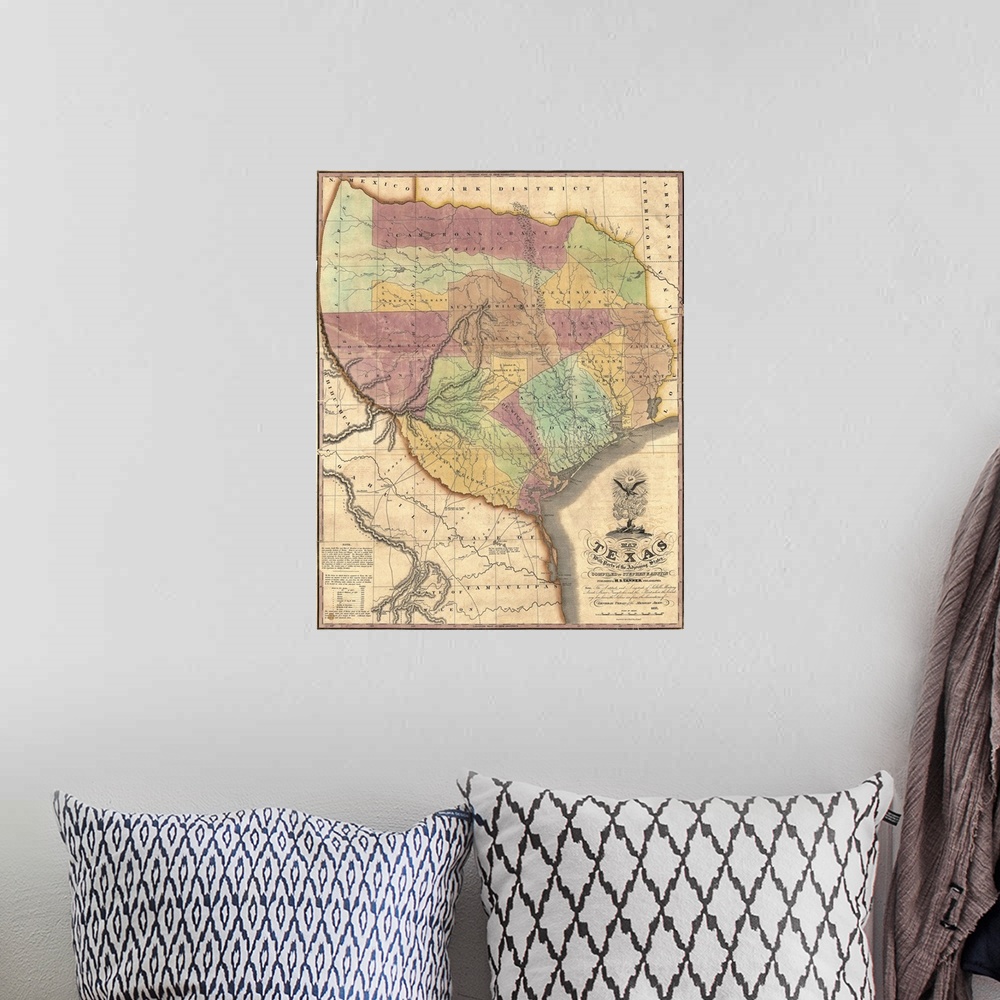 A bohemian room featuring This is a very old antique map of the Lone Star state in its very early history showing different...