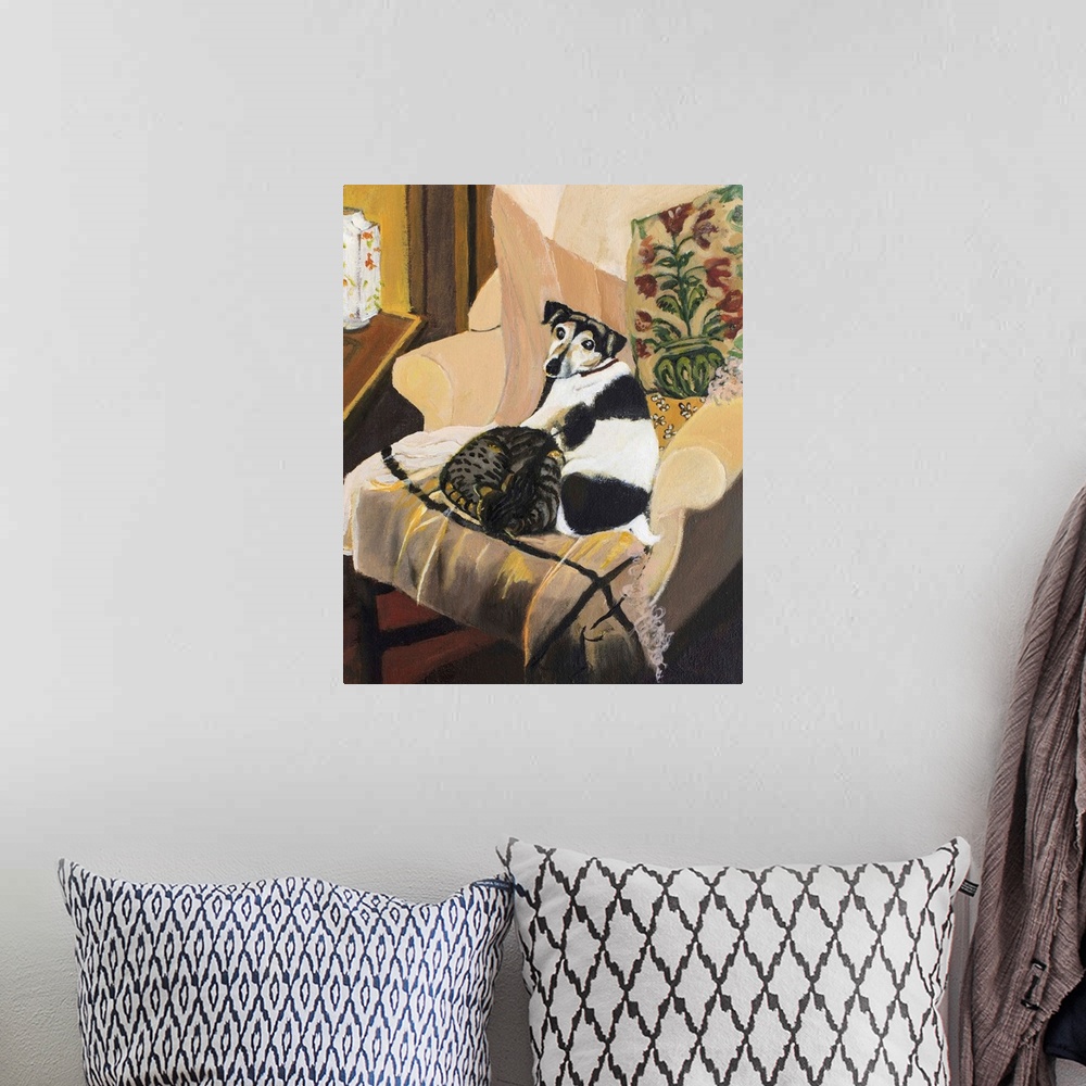 A bohemian room featuring Contemporary painting of a dog and a cat laying together on an armchair.