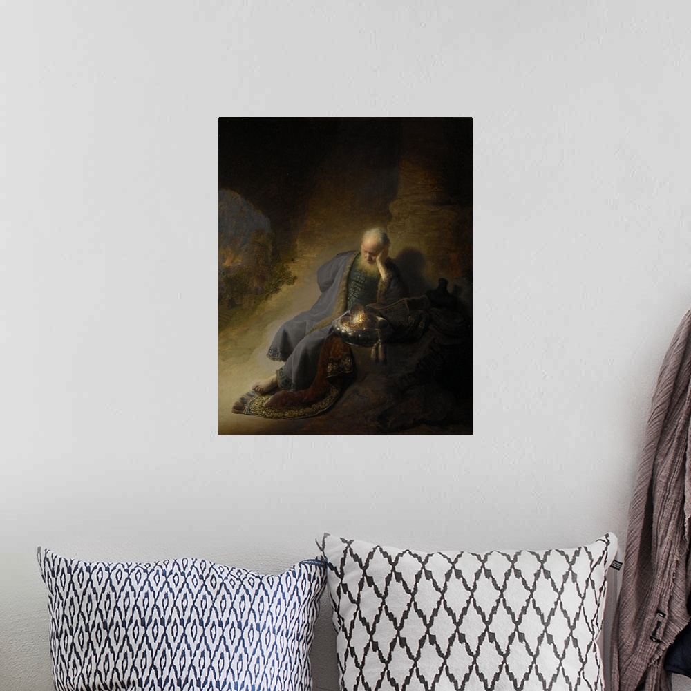 A bohemian room featuring Painting by Rembrandt of Jeremiah Lamenting of the destruction of Jerusalem.