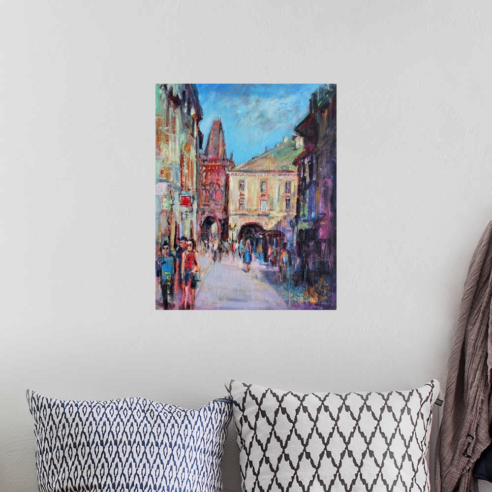 A bohemian room featuring Contemporary painting of streets of Prague.