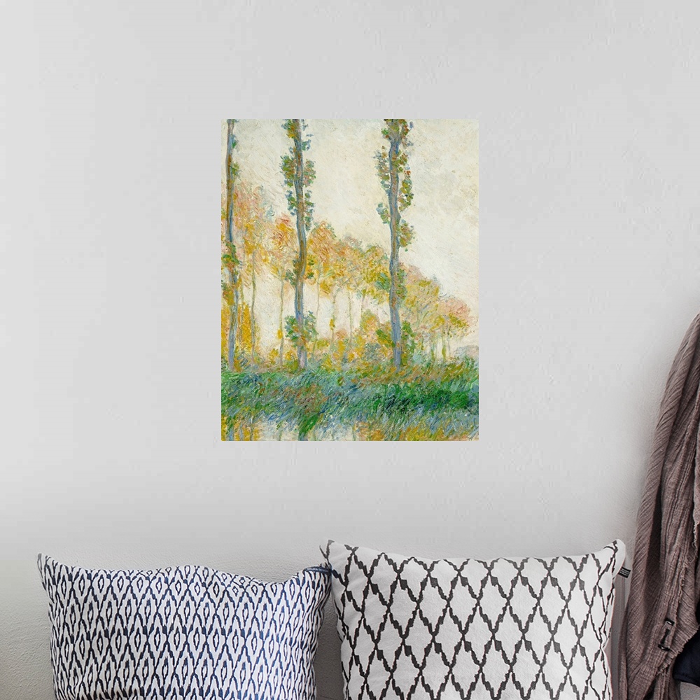 A bohemian room featuring Large oil painting of tall and thin trees lining a waterfront area with tall grass.
