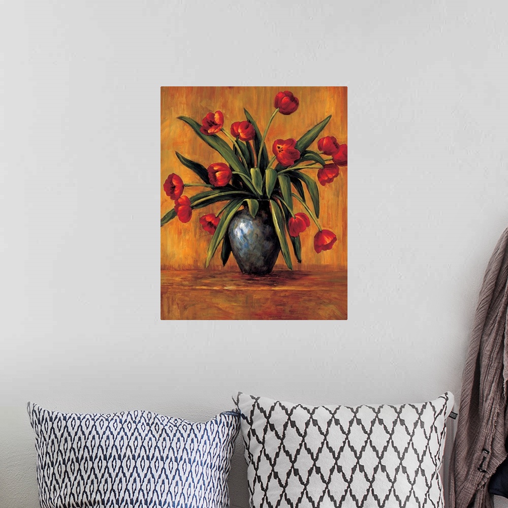 A bohemian room featuring Contemporary painting of red tulips in a vase with an orange, red, and brown background.