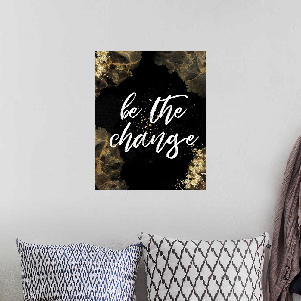 A bohemian room featuring Be the Change
