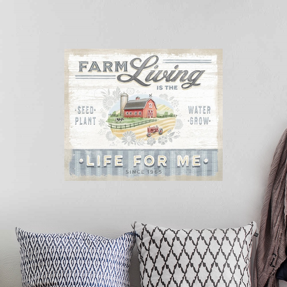 A bohemian room featuring Vintage farmhouse signage of a red barn evokes a sophisticated country style