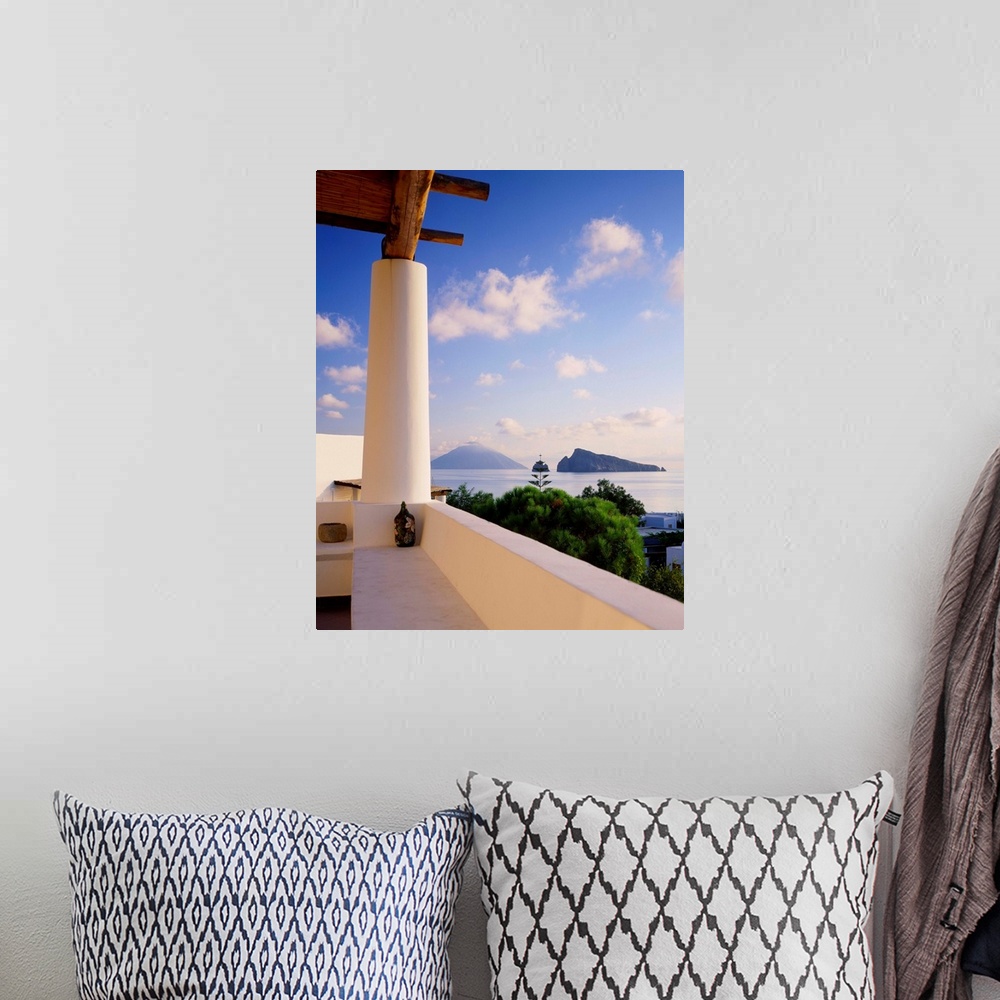 A bohemian room featuring Italy, Sicily, Panarea island, view to Basiluzzo islet and Stromboli island