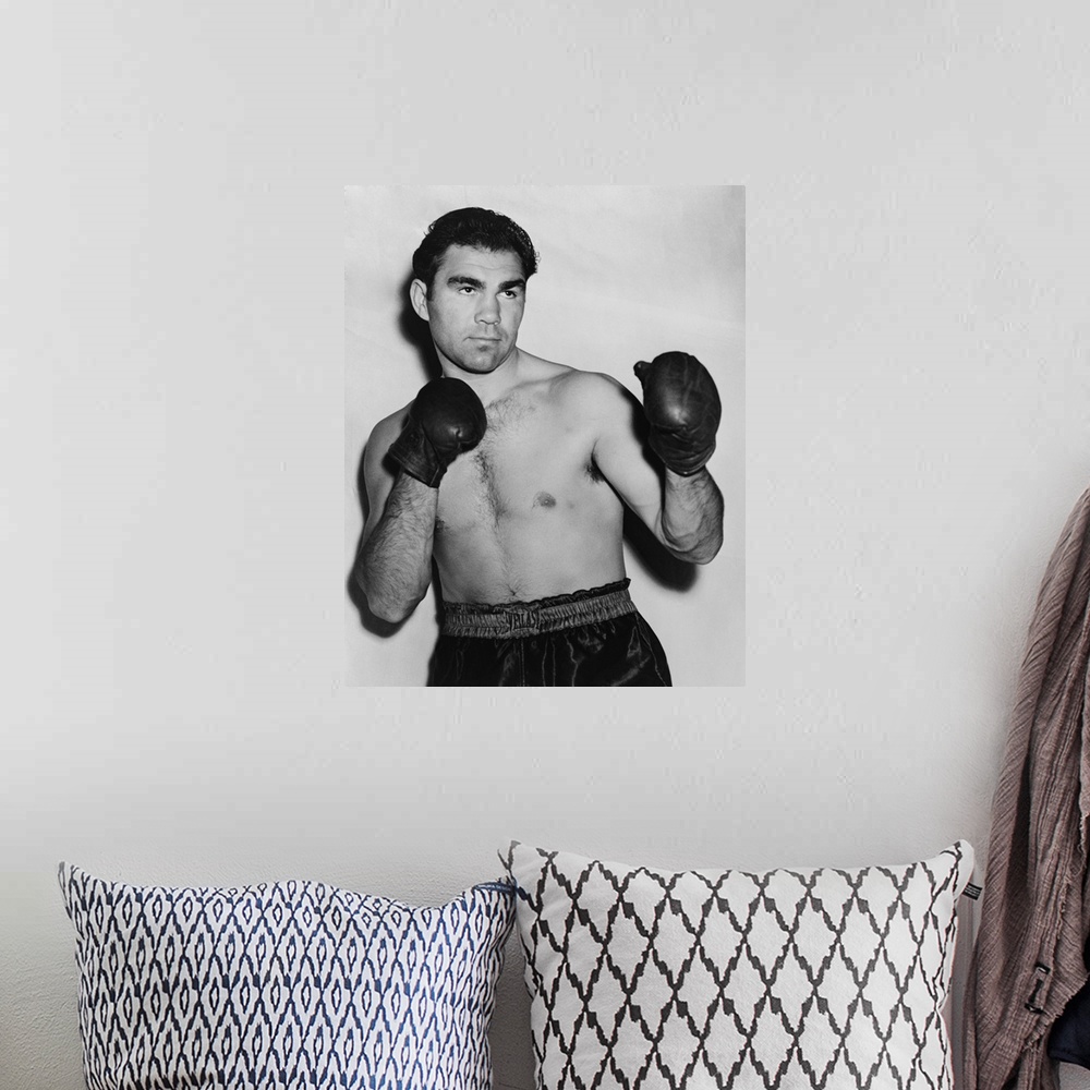 A bohemian room featuring German boxer Max Schmeling in a boxing pose in 1938. On June 22, 1938 he lost in a rematch with A...