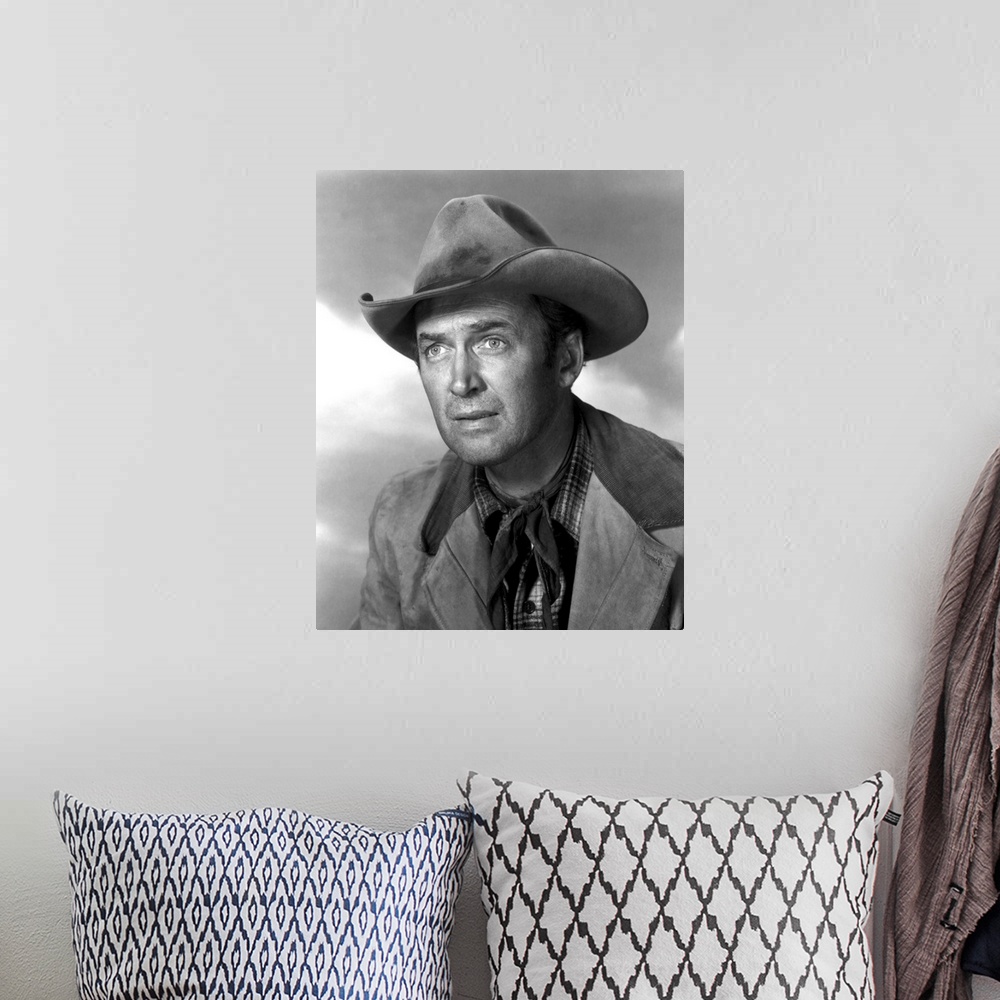 A bohemian room featuring James Stewart in The Far Country - Vintage Publicity Photo