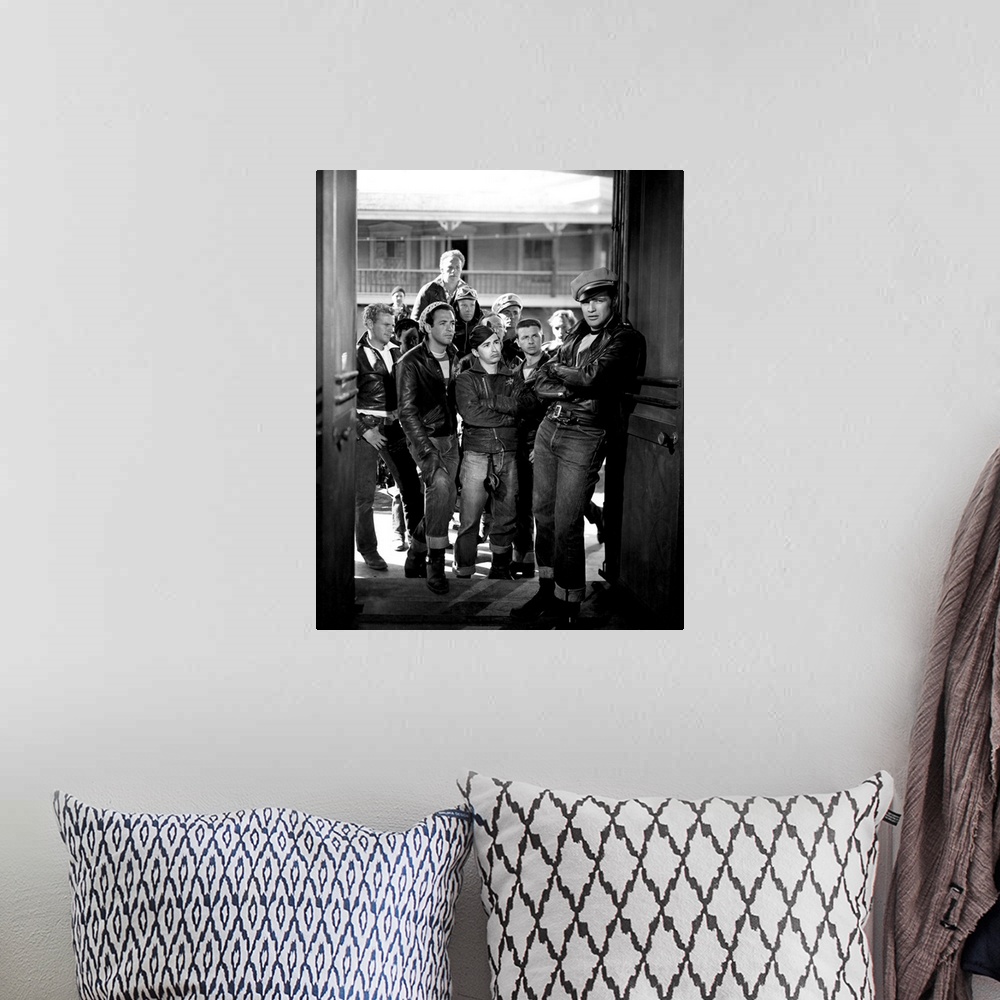 A bohemian room featuring Jerry Paris, Alvy Moore, Marlon Brando, The Wild One