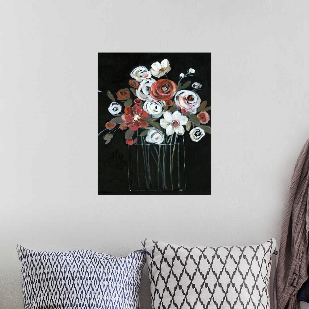 A bohemian room featuring Large vertical painting with white and red flowers in a glass vase on a solid black background cr...