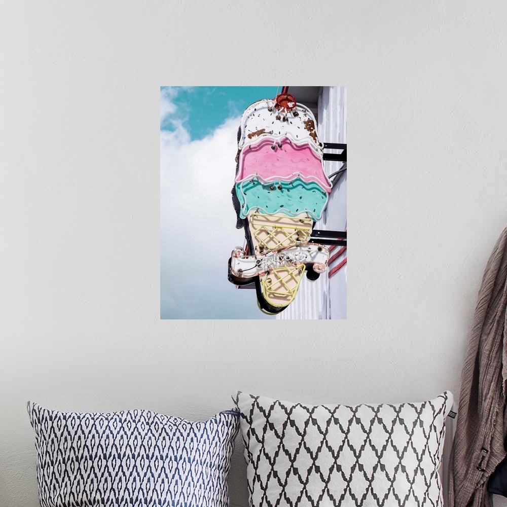 A bohemian room featuring Photograph of a vintage ice cream sign.