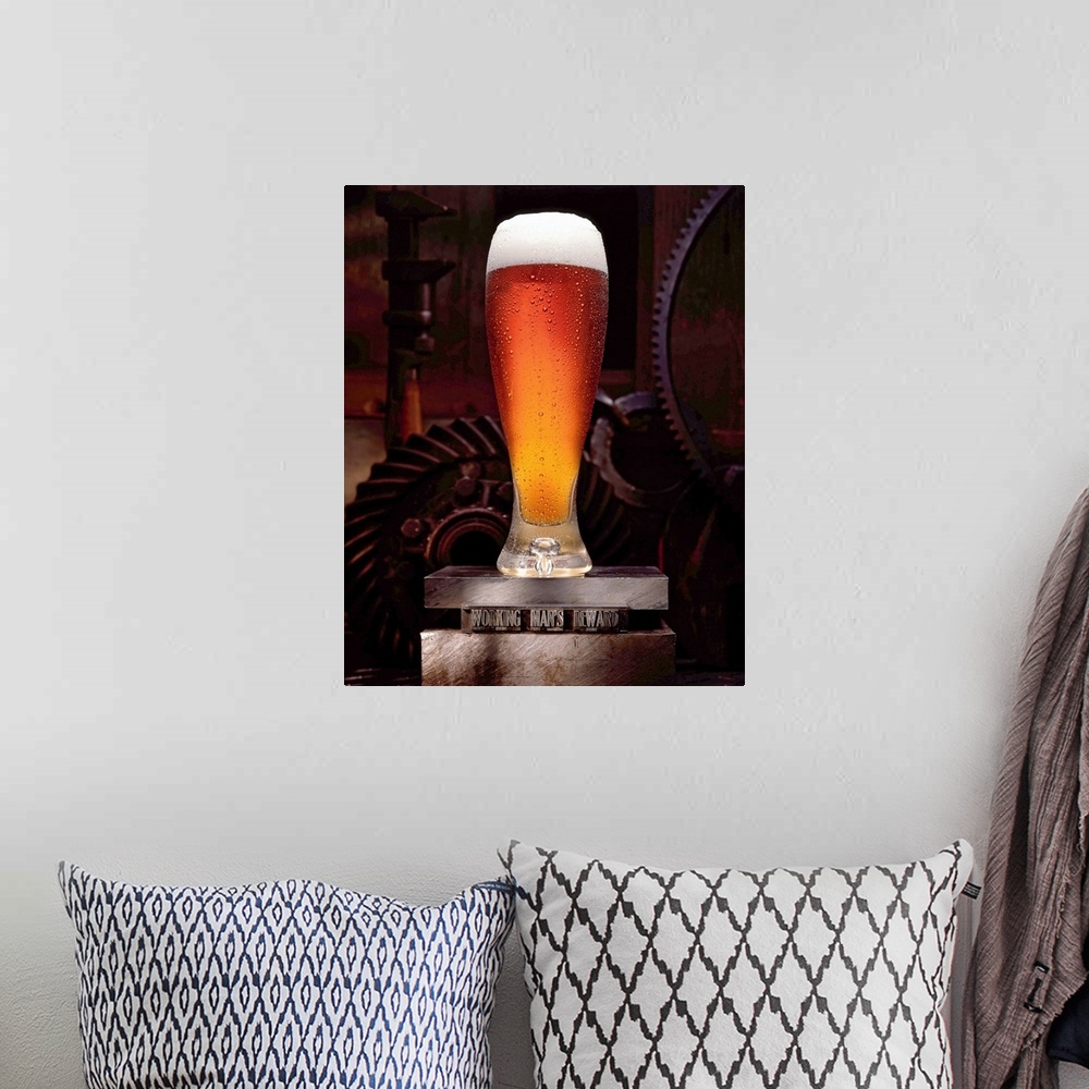 A bohemian room featuring Vertical, large wall picture of a tall glass of beer, foaming at the top, sitting on a platform t...