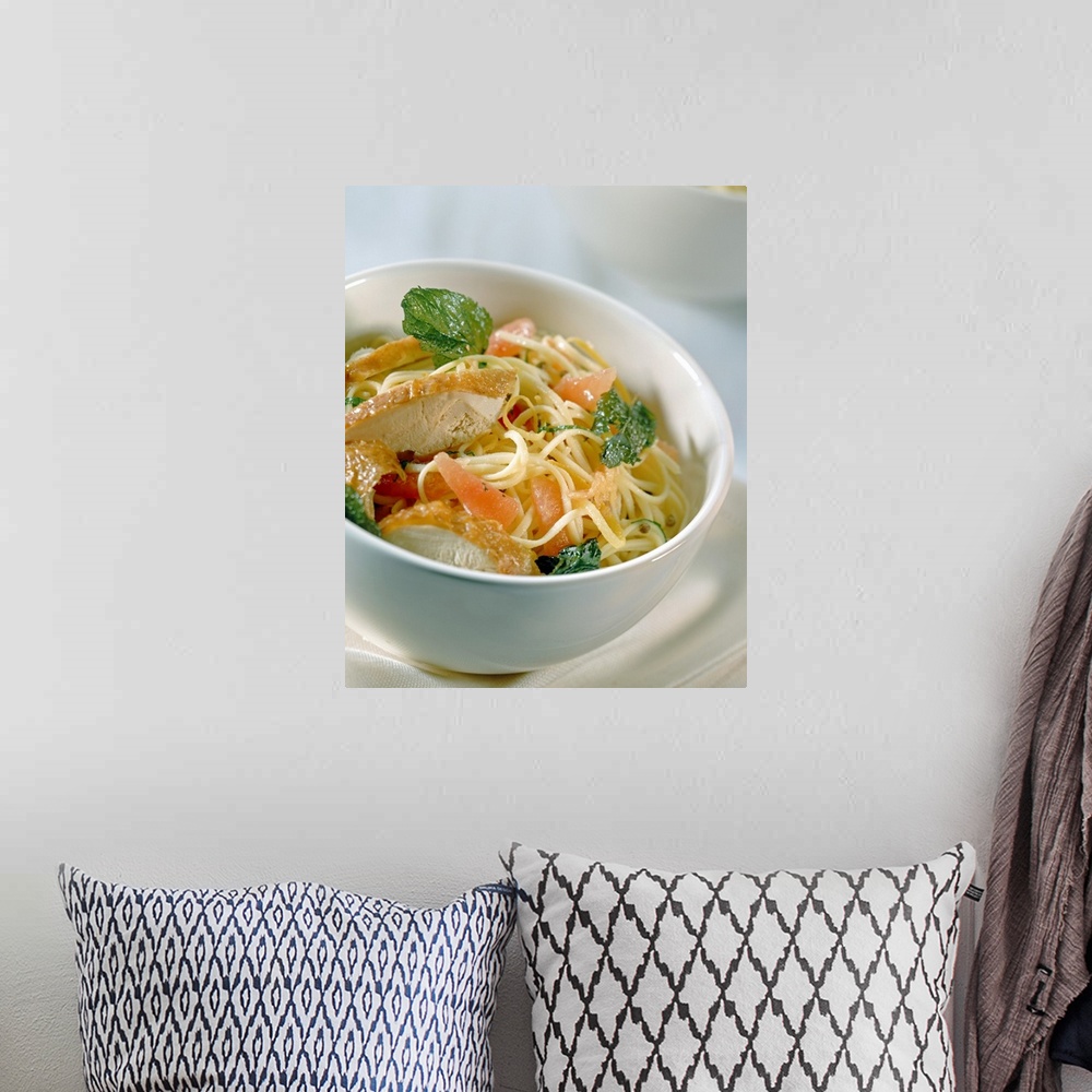 A bohemian room featuring Chicken pasta in bowl, close-up