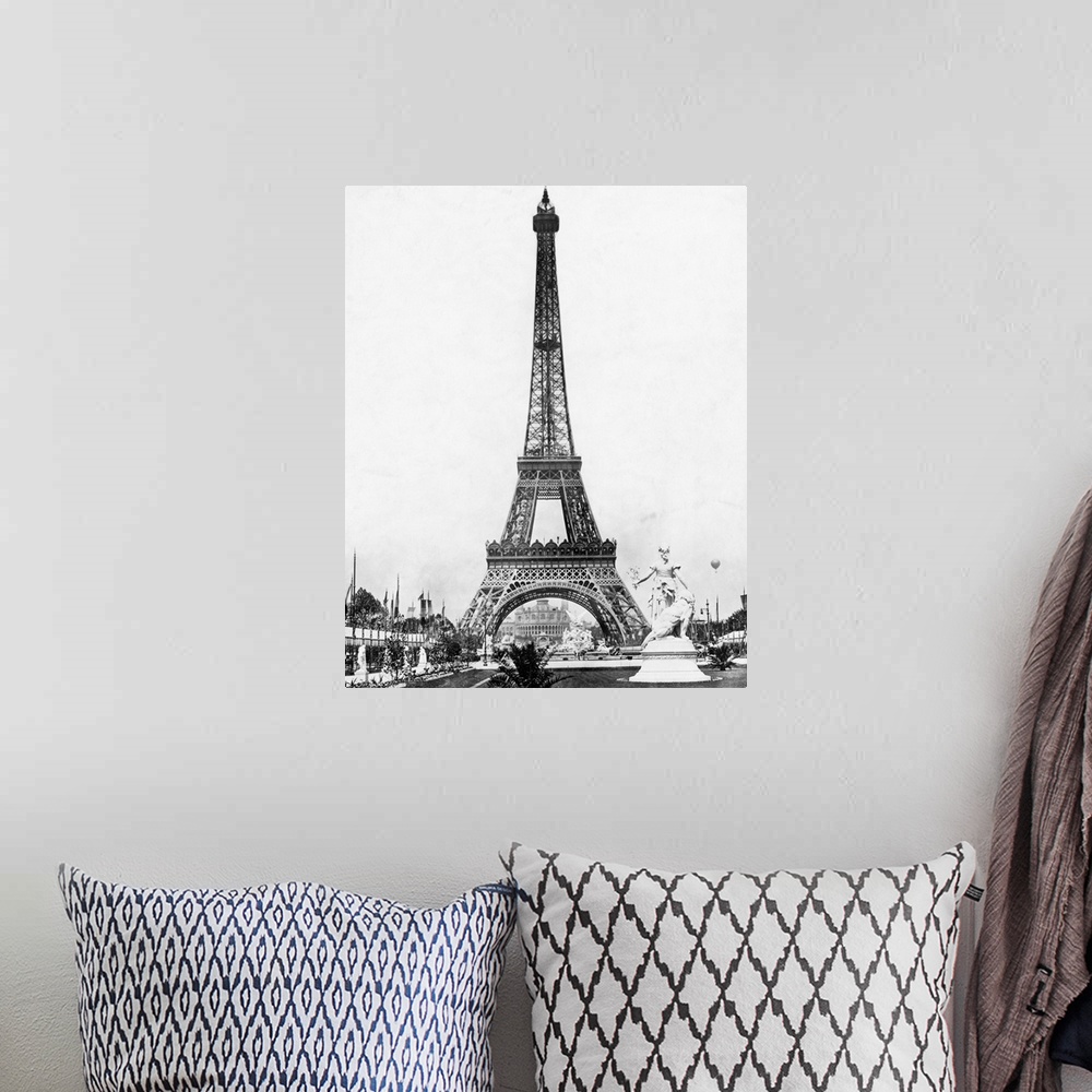 A bohemian room featuring Eiffel Tower from exhibition grounds.