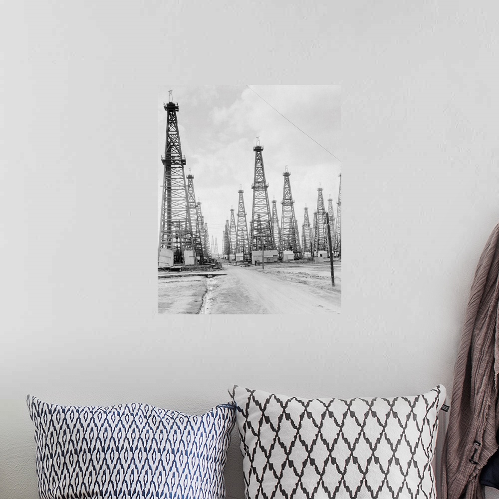 A bohemian room featuring U.S.A. Texas Beaumont spindle top oil fields.