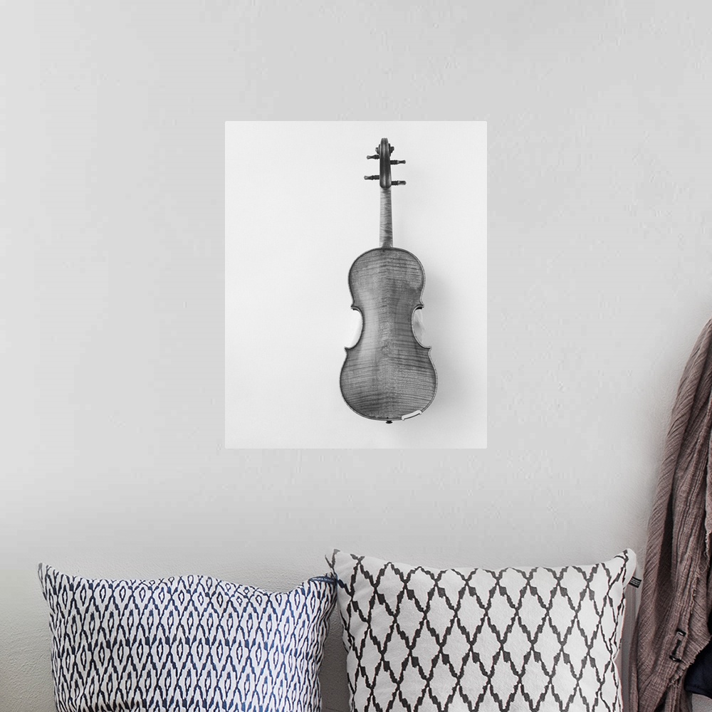 A bohemian room featuring Violin against white background, close-up
