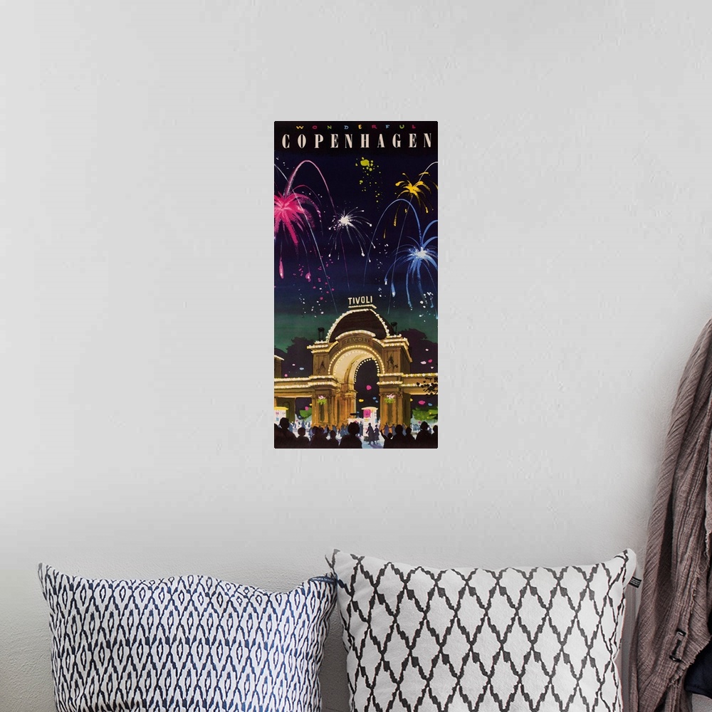 A bohemian room featuring ca 1960's travel poster of fireworks light night sky over Tivoli Gardens amusement park.