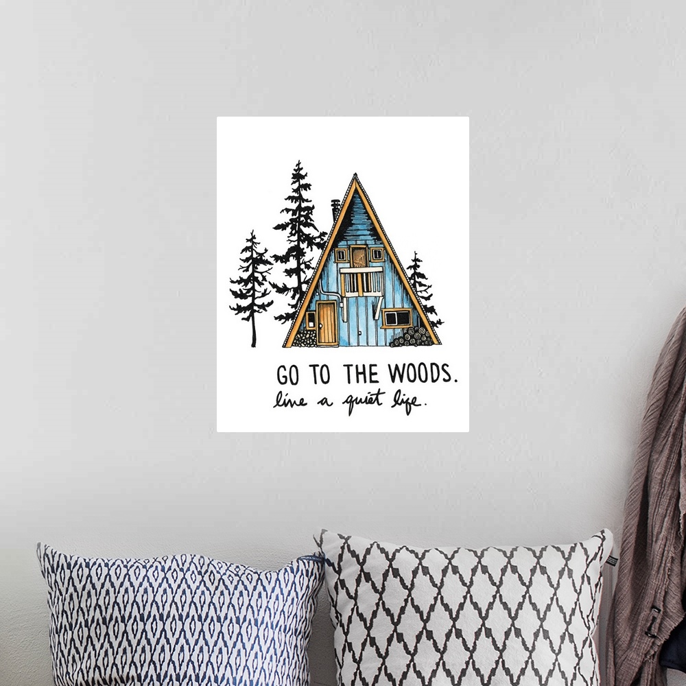 A bohemian room featuring Contemporary watercolor painting of an a-frame cabin in the woods with the phrase "Go to the Wood...