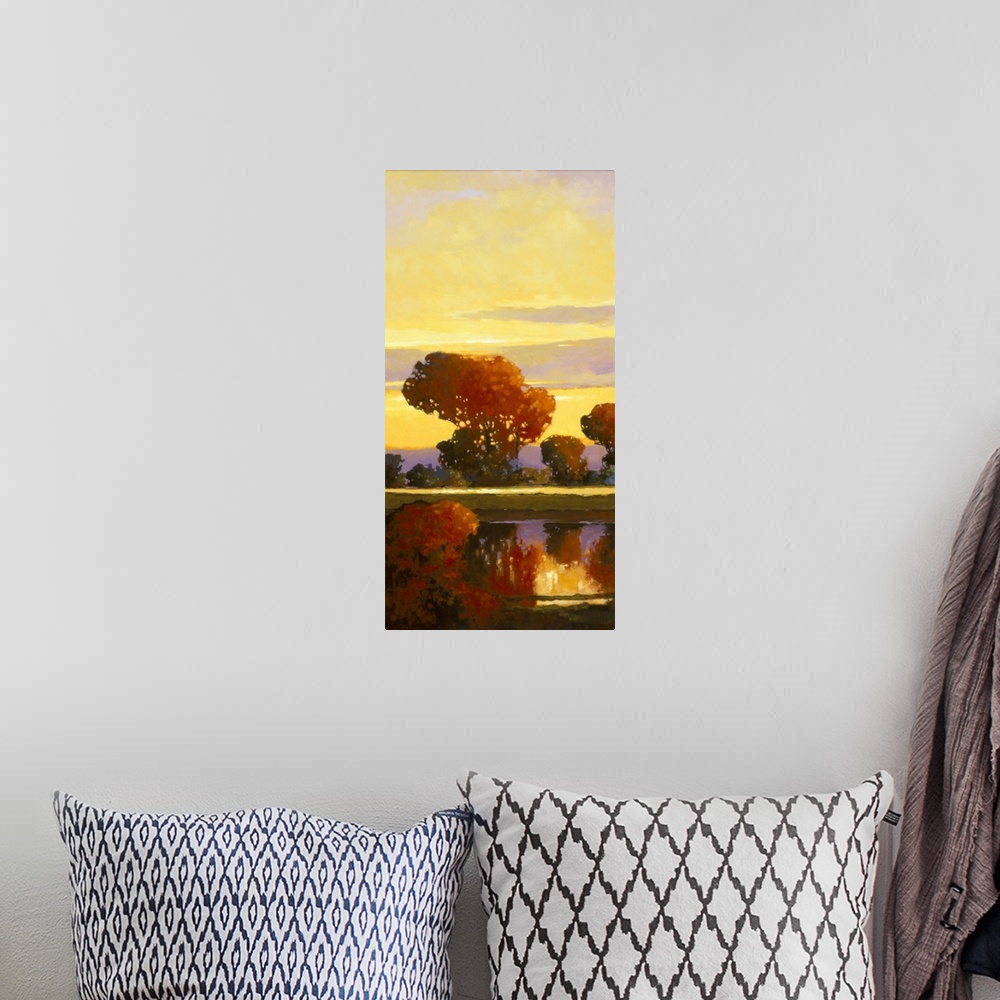 A bohemian room featuring Contemporary painting of a bright red tree reflected in a calm river.