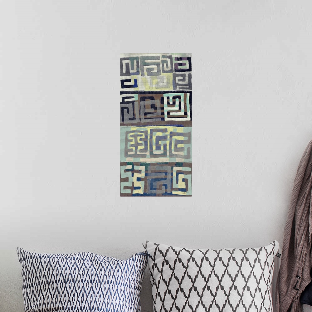A bohemian room featuring Details of woven Kuba cloth patterns in pastel tones.