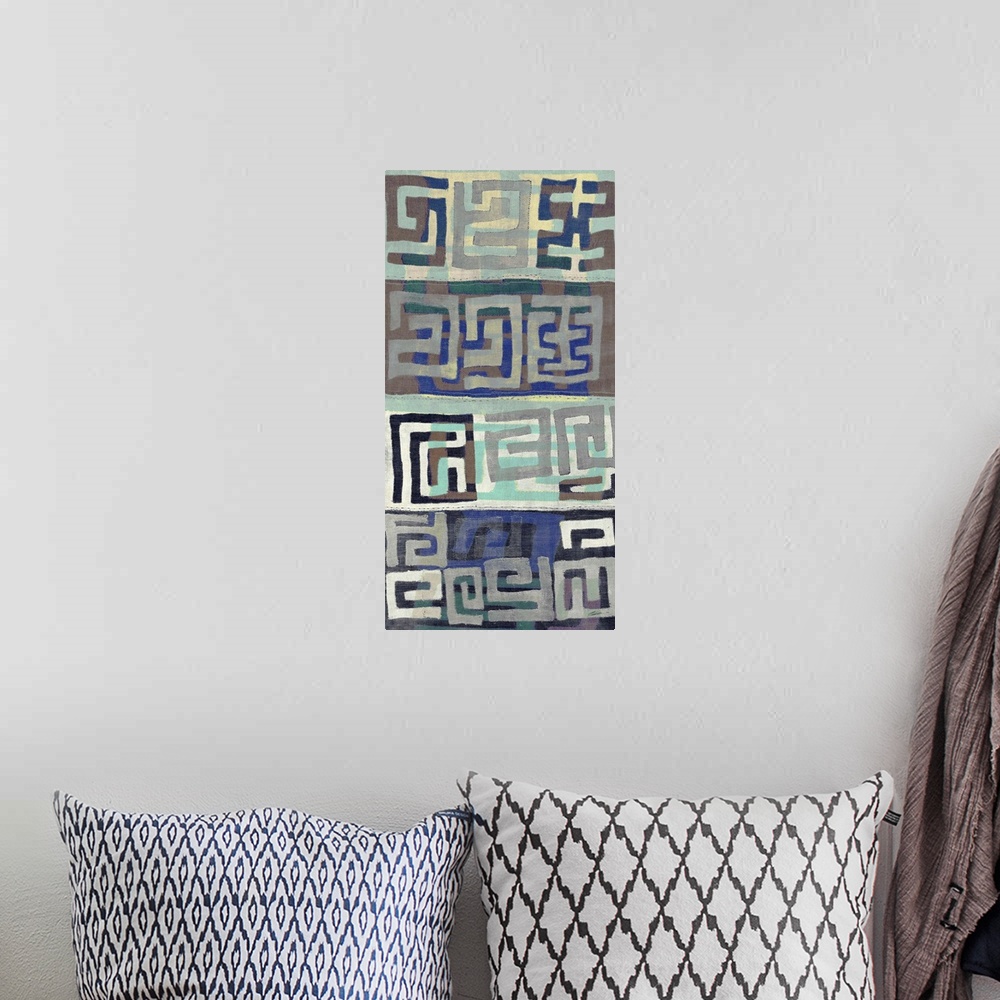 A bohemian room featuring Details of woven Kuba cloth patterns in pastel tones.