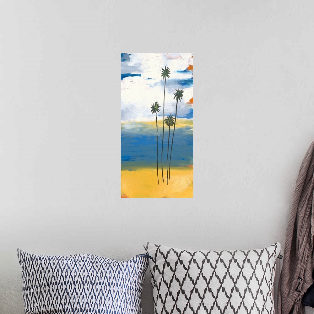 A bohemian room featuring Contemporary artwork of four slender palm trees on the beach with white clouds in the distance.