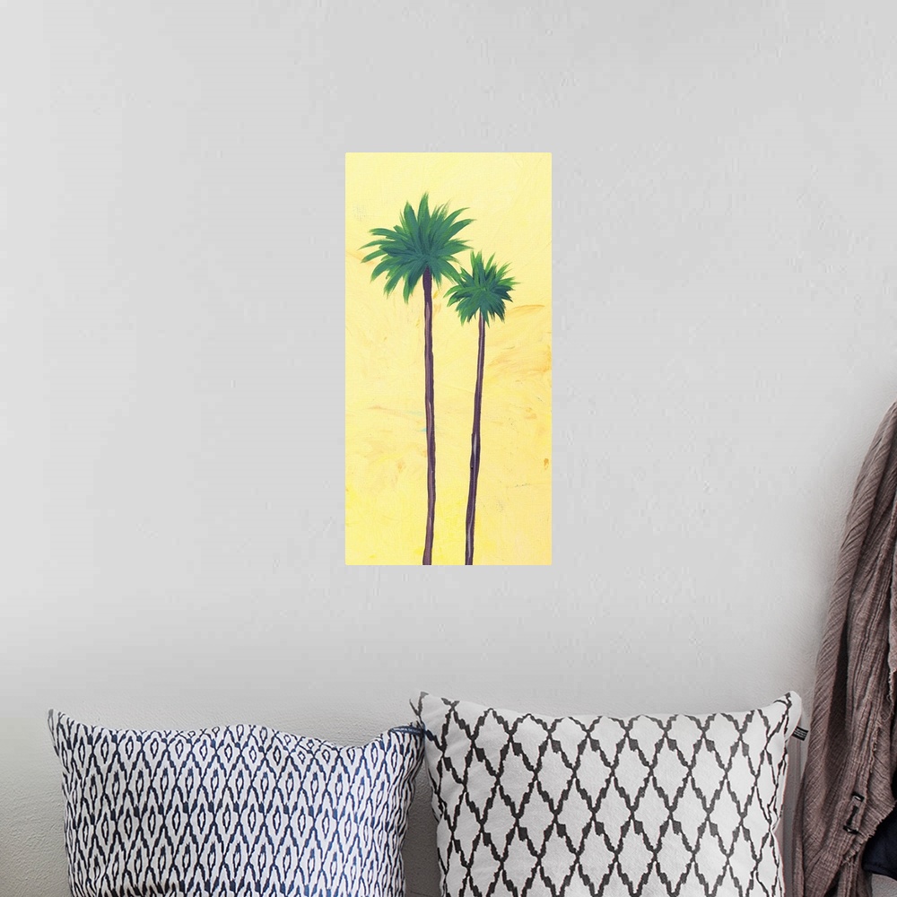 A bohemian room featuring Contemporary artwork of two tall palm trees with thin trunks against a yellow background.