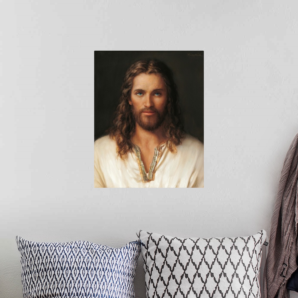 A bohemian room featuring Christ portrait.