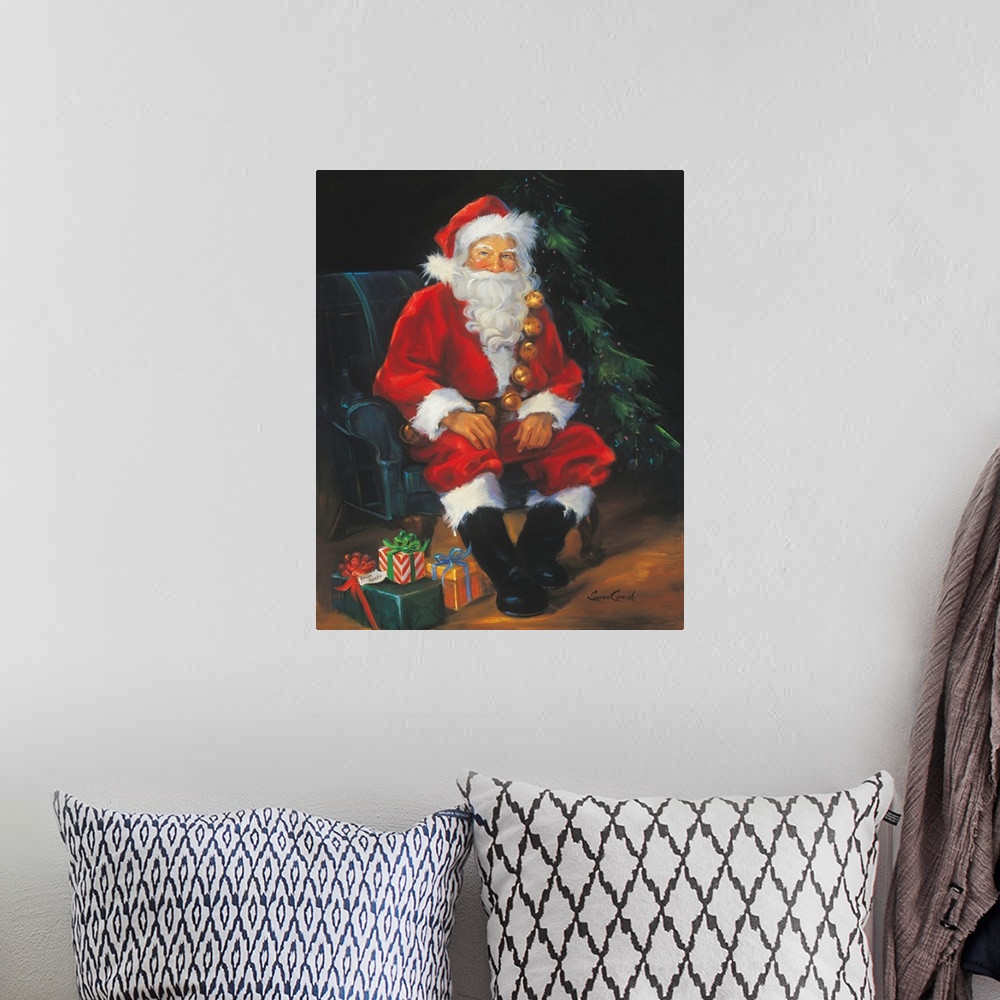 A bohemian room featuring Portrait of Santa Claus sitting by a tree with presents.