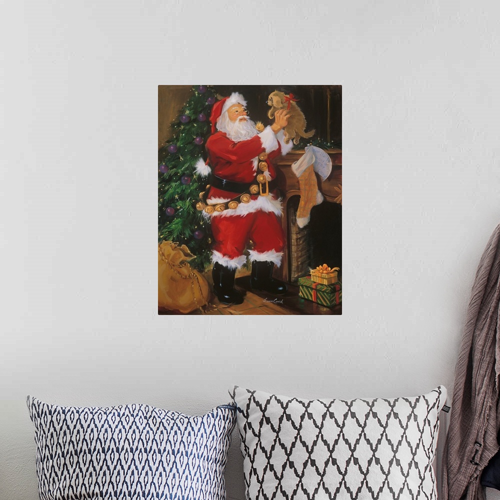 A bohemian room featuring Painting of Santa holding a puppy in front of  Christmas tree.
