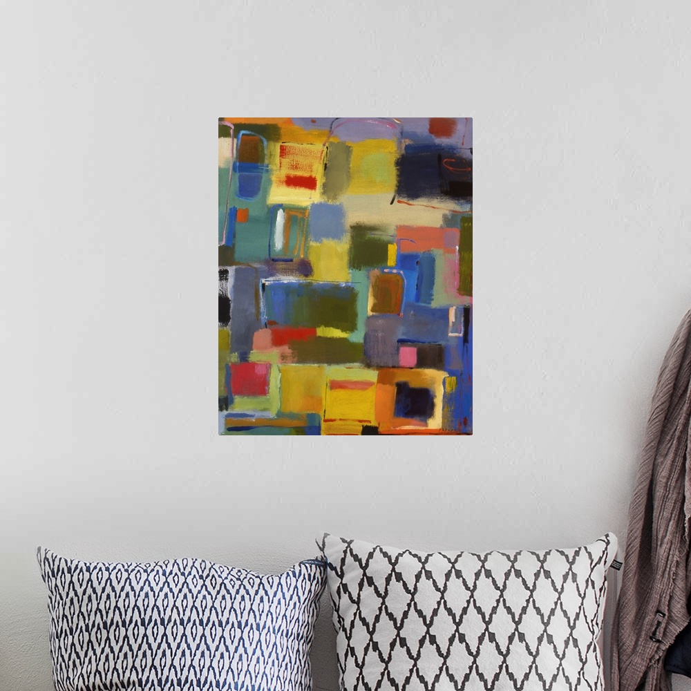 A bohemian room featuring Abstract painting of soft, rounded rectangular shapes in primary colors.