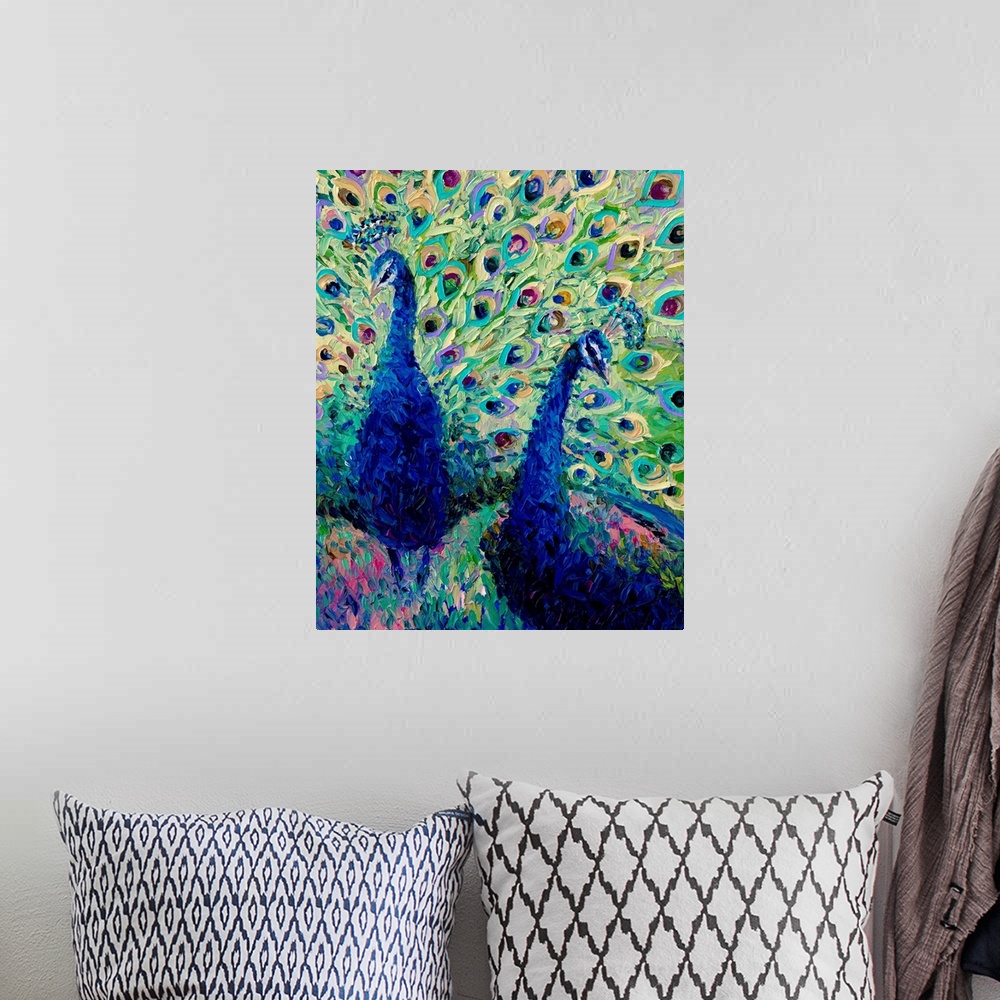 A bohemian room featuring Brightly colored contemporary artwork of colorful peacocks.