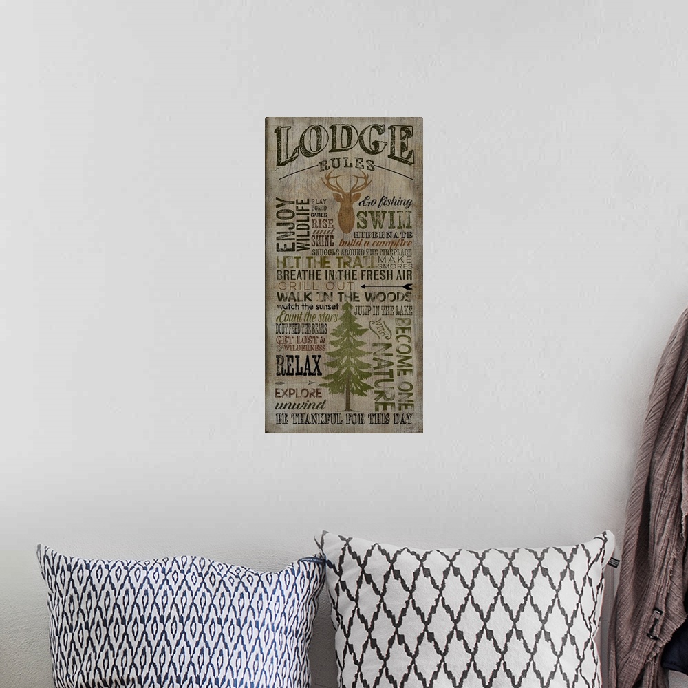 A bohemian room featuring Typography art of cabin rules with a weathered wood effect.