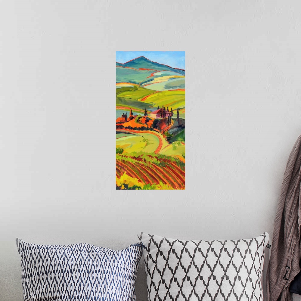 A bohemian room featuring Scene of Tuscan countryside with mountains in distance.