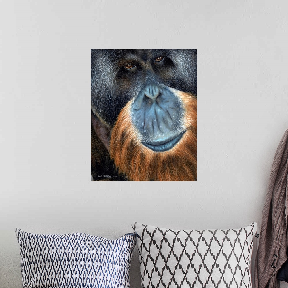 A bohemian room featuring Oil painting of a close up of an Orangutan.