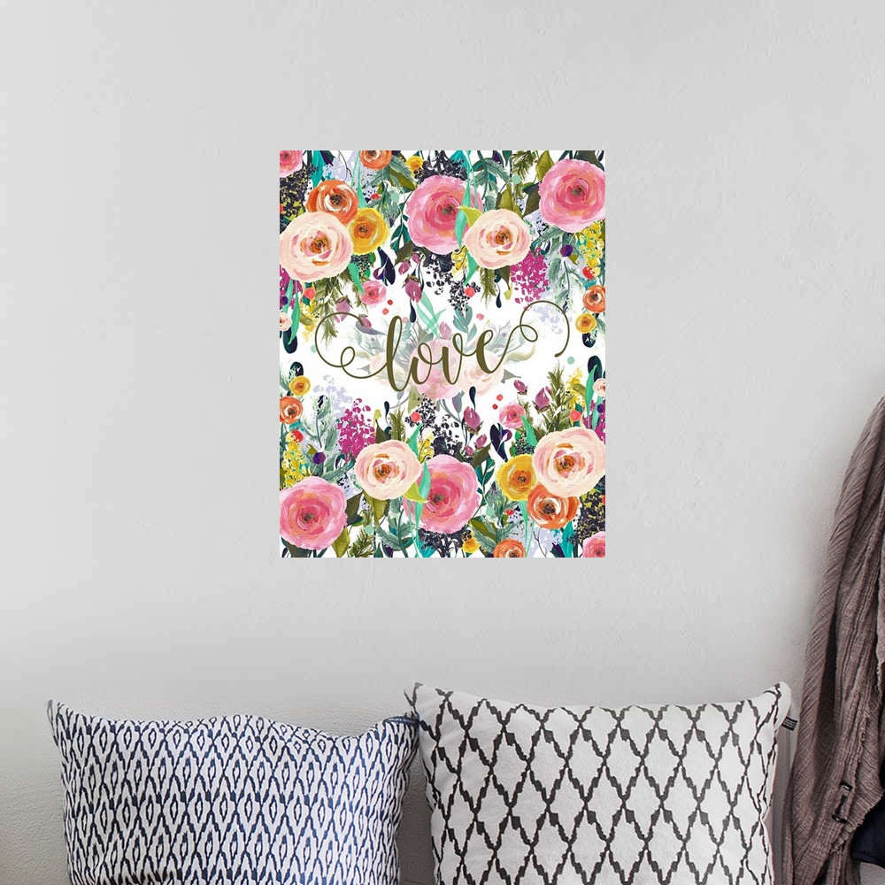 A bohemian room featuring A bright floral painting with the word "love" written in the middle.