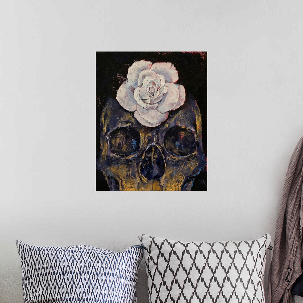 A bohemian room featuring A contemporary painting of a human skull with a white flower on the forehead.