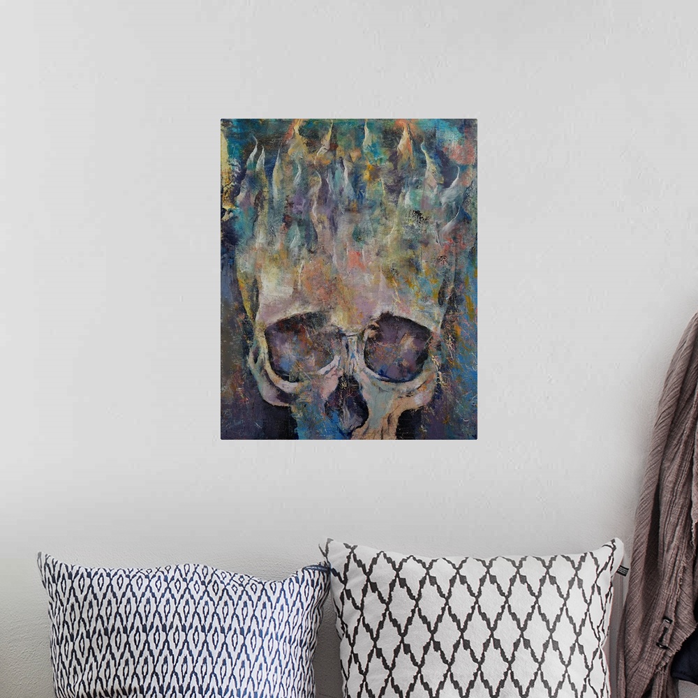 A bohemian room featuring A contemporary painting of a human skull with flames rising from the top.