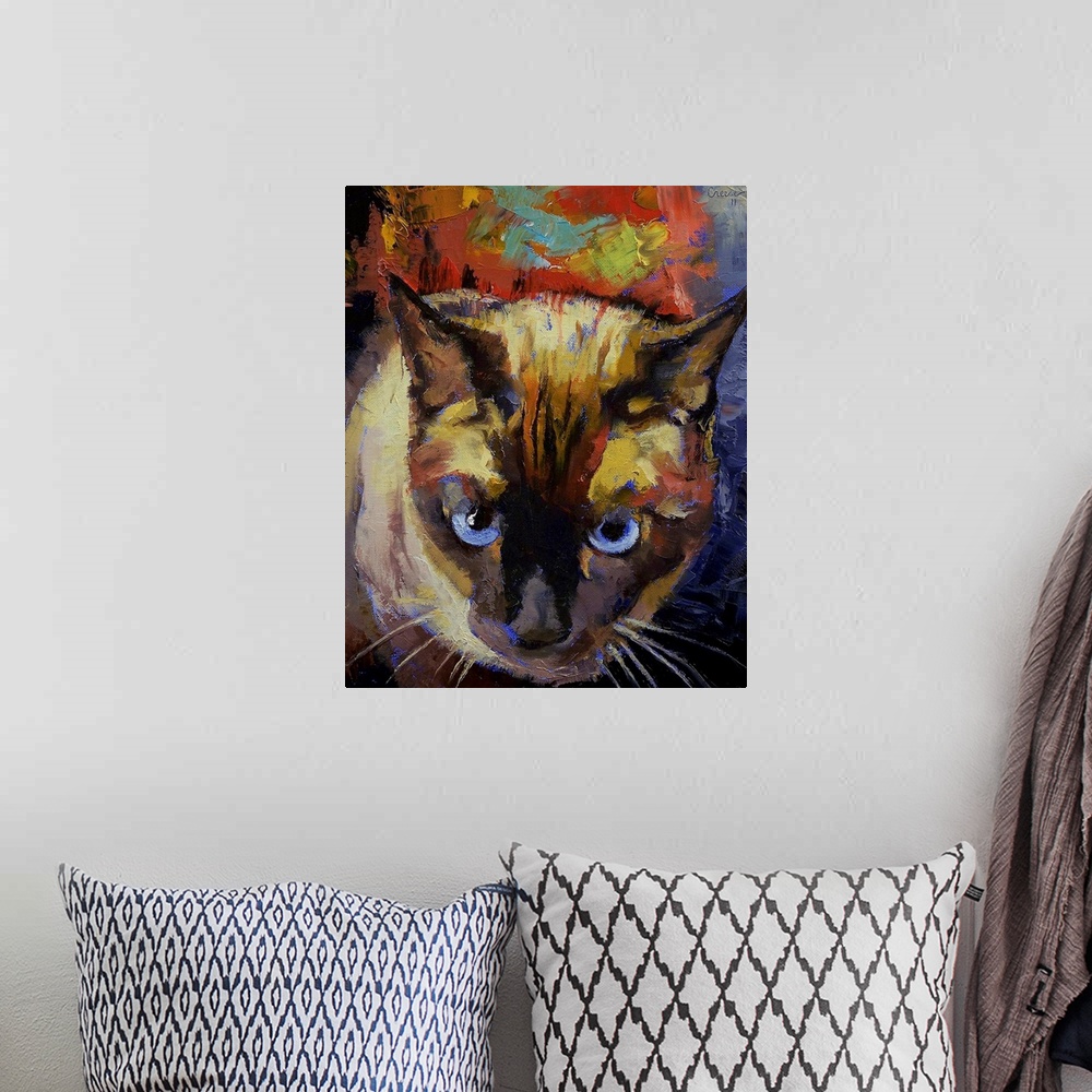 A bohemian room featuring Vertical, oversized painting looking down at the face of a Seal Point Siamese cat, on a backgroun...